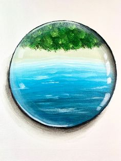 a painting of a blue ocean with trees in the center and water below it on a white surface