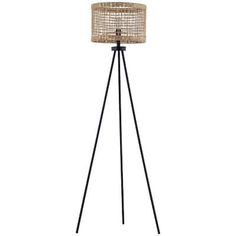 the floor lamp is made out of metal and has a rattan shade on it