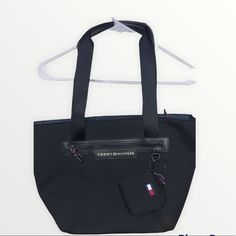 Tommy Hilfiger Tote Can Be Used As An Every Day Purse Or Gym Bag Offers Are Welcome!!! Tommy Hilfiger Bags With Zipper Closure For Everyday Use, Tommy Hilfiger Bags With Zipper For Everyday, Everyday Tommy Hilfiger Bag With Zipper Closure, Tommy Hilfiger Shoulder Bag For Travel, Tommy Hilfiger Black Shoulder Bag For Daily Use, Tommy Hilfiger Travel Shoulder Bag, Tommy Hilfiger Black Bags For Daily Use, Black Tommy Hilfiger Bag For Daily Use, Tommy Hilfiger Black Shoulder Bag