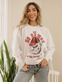 This is a PRE-ORDER item. Please allow 1-2 weeks for shipping. Our 50/50 Preshrunk Cotton/Polyester thrifted sweatshirts are meaningfully distressed and officially licensed. Each piece is one of a kind, and colors/distressing may vary from shirt to shirt.Pairs well with vintage denim and your favorite kicks.The details:- 50/50 Preshrunk Cotton/Poly Blend - Officially Licensed- Meaningfully Distressed, each piece unique- Colors + Distressing may vary Go Dawgs, Kane Brown, The Beach Boys, Willie Nelson, Dolly Parton, Pop Up Shop, Rolling Stones, 50 50, Unique Colors