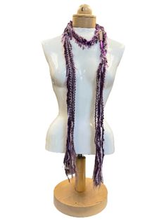 These beaded scarf necklaces are made with Italian silk yarns, Mohair and other yarns. A great accent for your holiday wardrobe. They are lightweight and comfortable to wear. Measuring 48 inches in length. A mix of eggplant and lavender with beads. Comes in linen gift pouch. Purple Bohemian Scarf, One Size, Purple Bohemian Scarf One Size, Purple Bohemian Scarf As Gift, Bohemian Purple Scarf One Size, One Size Purple Bohemian Scarf, One Size Bohemian Purple Scarf, Purple Yarn Scarf, Purple Bohemian Scarves For Winter, Purple Bohemian Scarf For Winter