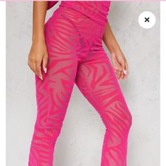 Prettylittlething Hot Pink Zebra Devore High Waisted Flared Pants Pull On Elastic Waistband Sheer Velvet Zebra Print Product Details "Add A Pop Of Pink Into Your New Season Wardrobe With These Bottoms Doll. Featuring A Hot Pink Zebra Devore Material With A High Waist And A Flared Fit, They Are Perfect. Team This With The Matching Top, Orange Sandals And A Shoulder Bag For An Insta-Worthy Combo." Length Approx 35.5" (Based On A Sample Size Uk 8) Model Wears Us 4 Model Height 5ft 7" Color: Hot Pin Stretch Zebra Print Bottoms For Summer, Chic Summer Bottoms With Zebra Print, Summer High-waisted Party Leggings, High-waisted Leggings For Summer Parties, Pink Party Leggings For Summer, High Waist Zebra Print Bottoms For Spring, Party Zebra Print Bottoms, Pink Stretch Full-length Yoga Pants, Pink 4-way Stretch Bottoms For Loungewear