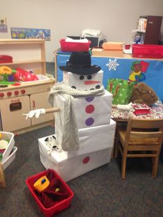 a room filled with lots of toys and furniture