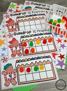 three gumdrop christmas games on top of each other with candy and candies in the background