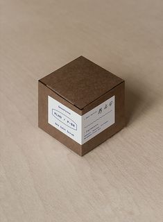 a brown box sitting on top of a wooden table