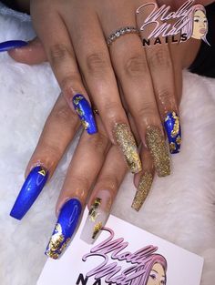 Prom Nails, Fancy Nails, Bling Nails, Wedding Nails, Cute Nails, Pretty Blue Gold And Black Nails, Gold And Royal Blue Nails, Royal Blue And Gold Acrylic Nails, Blue And Gold Nail Designs, Royal Blue And Gold Nails, Blue Nails With Gold, Blue And Gold Nails, Gold Coffin Nails, Nails With Gold