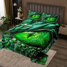 a bed covered in green leaves on top of a wooden floor