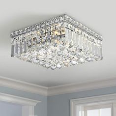 a crystal chandelier hanging from the ceiling