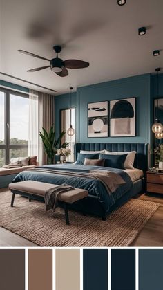 a bedroom with blue and brown walls, carpeted flooring and ceiling fan in the corner