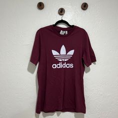 Mens Adidas T-Shirt Plum Color, Size Medium Nwt Basic Adidas Crew Neck Tops, Adidas Crew Neck Shirt With Letter Print, Basic Adidas Short Sleeve Top, Adidas Cotton T-shirt With Crew Neck, Basic Adidas Logo Crew Neck Tops, Adidas Basic Short Sleeve Top, Adidas Crew Neck Shirt With Logo Print, Adidas Cotton Short Sleeve Shirt, Adidas Short Sleeve Shirt With Letter Print