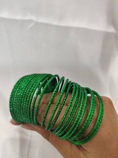 Welcome to our shop We bring to you very ethnic products from core of India almost every thing is handmade or custom made Set of 22 Bangles in multiple colors Size 2.4 We will be happy to serve you Bohemian Stackable Bangle For Party, Stackable Bohemian Bangle For Party, Handmade Green Bangle For Festival, Handmade Green Bangle For Festivals, Handmade Green Bracelets For Festivals, Green Bangle Jewelry For Festival, Green Bangle Jewelry For Festivals, Handmade Green Bangle For Party, Handmade Green Bangle For Festive Occasions