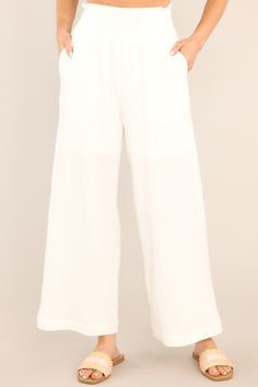 It looks as if you have it All Under Control today, in your chic and comfy ivory pants! I’ll bet it feels great to put on these relaxed fitting bottoms and check one more thing off your to do list! These pants features a smock stretch waistband, pockets at the hip, and a wide flowy leg. 100% Cotton Unlined Hand Wash Cold Imported Model is wearing a small Ivory Pants, Sorority Rush Dresses, Rush Dresses, Cardigan Crop Top, Cardigan Crop, Red Dress Boutique, Dress Bra, Beach Pants, Friend Outfits