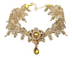 This is an alluring, golden Victorian lace choker. This is a fantastic piece of Gothic style jewelry. Add a stunning, Victorian inspired touch neckline with this glistening, yellow sunshine-inspired lace choker collar. Choker details: -  Handmade in USA -  Adjustable size -  Closes with an easy-to-use lobster clasp This dazzling lace choker is part of the limited lace choker collection from Twisted Pixies. Available stock won't last forever. The jewelry and accessories by Twisted Pixies are hand-crafted to help you celebrate your love of all things other-worldly. Express your love of the darkness by simply adding some jewelry here or there with the clothes that you already have in your closet. This golden lace collar is made and ready to ship out to your home in just 3 days or less of your Golden Lace, Gothic Chokers, Nu Goth, Victorian Lace, Victorian Gold, Gold Lace, Choker Collar, Lace Collar, Gothic Fashion