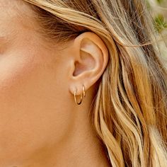 An instant classic - small 14k gold hoop earrings made for everyday stacking. Wear solo or mix & match with your favorite earring or diamond studs. Make it a single Product Details 14k solid gold 15 mm profile diameter and 1.2 mm wide Hinge closure | Classic 15 Mm Hoops Earring in 14K, Women's by Gorjana Elegant Stackable Hoop Earrings As Gift, Elegant Stackable Hoop Earrings For Gift, Classic 14k Gold Filled Hoop Earrings For Everyday Luxury, Classic Stackable Huggie Earrings, Elegant Sterling Silver Stackable Hoop Earrings, Small Hoop Stackable Fine Jewelry Earrings, Elegant Gold Stackable Hoop Earrings, Stackable Small Hoop Earrings Fine Jewelry, Stackable Small Hoop Earrings In Fine Jewelry