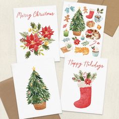 three christmas cards with watercolor drawings of trees and stockings on them, one has a poinsetti