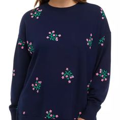 Updated With Cozy Drop-Shoulder Sleeves, This Sweeper-Length Pullover Is Enriched With Charming Floral Embroidery. Product Details Pullover Crew Neck Long Drop Shoulder Sleeves Runs Big Product Specifications 29 In Length Material & Care Cotton, Polyester Machine Washable Side Slits For Relaxed Comfort Spring Embroidered Tops For Loungewear, Embroidered Tops For Spring Loungewear, Spring Loungewear Tops With Floral Embroidery, Spring Floral Embroidered Tops For Loungewear, Floral Embroidered Tops For Spring Loungewear, Blue Long Sleeve Sweatshirt With Floral Embroidery, Pink Long Sleeve Sweatshirt With Floral Embroidery, Spring Moisture-wicking Long Sleeve Sweatshirt, Embroidery Product