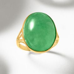 Ross-Simons - Jade Ring in 14kt Yellow Gold. Size 8. Every jewelry box needs a touch of jade! This glossy statement ring showcases a fabulous 15x20mm oval jade cabochon bursting with its signature green hue. Set in polished 14kt yellow gold on a unique open-space split shank. 3/4" wide. Jade ring. Formal Oval Jade Emerald Ring, Modern Oval Jade Jewelry, Modern Oval Jade Ring, Coral Drop Earrings, Sky Blue Topaz Ring, Swiss Blue Topaz Ring, Phoenix Pendant, Elephant Pendant Necklace, Lapis Ring