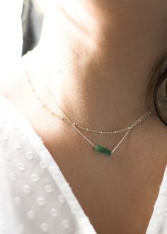 "Highlights * Made With 14k Yellow Gold Filled or Sterling Silver Pieces * Features a 13mm (About 1/2\") Genuine Jade Pendant * Available In 14\", 16\", 18\", 20\", 22\" Lengths About This Piece Our dainty jade necklaces are a great way to carry your most special moments with you! These simple and minimal necklaces are made to suit anyone and will last a lifetime. Our gemstones and their colors are authentic; they are not dyed or altered!" Minimalist Green Jewelry For Everyday Wear, Minimalist Jade Jewelry For May Birthstone, Green Jewelry With Delicate Chain For Layering, Minimalist Green Stackable Jewelry, Minimalist Jade Jewelry, Jade Necklaces, Everyday Necklaces, Necklace Everyday, Bar Pendant Necklace