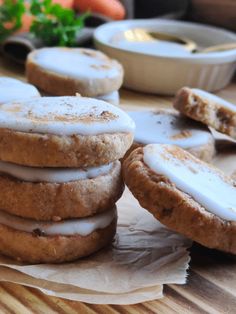 there are several cookies with icing on the table