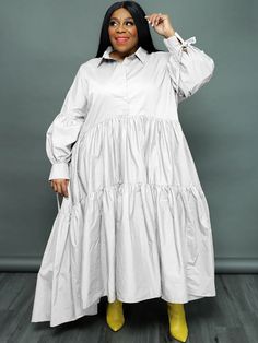 Material:90-95% Polyester & Spandex. Features:Plus size. long sleeve. button. ruffle. solid color. loose. maxi dress.Style: Casual Run Big. Order One Size Down Billowy Long Sleeve Casual Midi Dress, Billowy Long Sleeve Midi Dress, White Billowy Long Sleeve Maxi Dress, Billowy Long Sleeve Casual Maxi Dress, Billowy Long Sleeve Maxi Dress With Ruffles, Long Sleeve Billowy Dresses In Solid Colors, Floral Dress Formal, Swing Design, Boho Swimwear