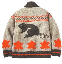 a sweater with an image of a raccoon on the front and leaves on the back