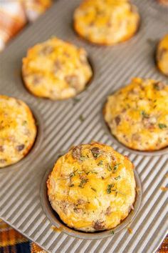 mini muffins with cheese and herbs in a baking pan