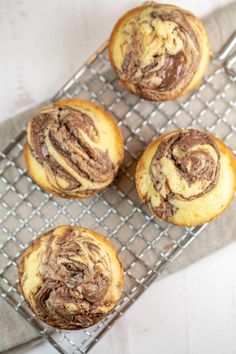 Nutella Swirl Cupcakes: Rich, buttery cupcakes with decadent swirls of nutella baked right on top.  These easy self-frosting nutella cupcakes are the perfect recipe to share! Vanilla Nutella Cupcakes, Buttery Cupcakes, Latin Desserts, Cookies 2023, Recipes To Feed A Crowd, Nutella Recipes Easy, Nutella Cupcakes, Swirl Cupcakes, Bunsen Burner