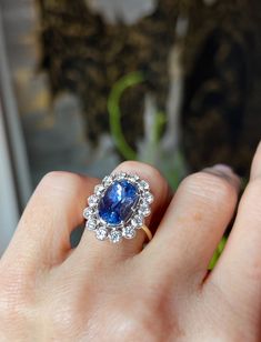 Beauty, grace, and coolness -- the Aerin ring is quintessential Nora. A pulse-quickening design for the ages. 5.24ct oval blue sapphire untreated from Sri Lanka antique diamonds measure 2.5mm, total weight is 1ct 18k white gold setting 18k yellow gold band size 7; can be resized For enquiries, email info@norakogan.com Luxury Sapphire Oval Halo Ring, Luxury Oval Sapphire Halo Ring, Platinum Oval Halo Ring With Gemstone, Oval Platinum Halo Ring With Gemstone, Dazzling Oval Sapphire Diamond Ring, Classic Blue Marquise Sapphire Ring, Oval Sapphire Ring With Halo Setting In Platinum, Timeless Oval Sapphire Ring, Oval Sapphire Ring In Platinum