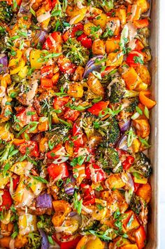 a casserole dish filled with lots of different types of vegetables and seasonings