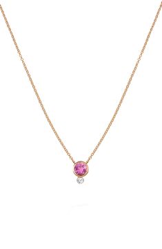 A bright pink sapphire alight with a diamond bezel anchors the 14-karat-gold chain of this wear-anywhere necklace. 16" length; 2" extender; 1/4" pendant diameter 14k gold/pink sapphire/diamond Imported >Diamond Guide Pink Pendant Necklace, Pink Diamond Jewelry, Pink Sapphire Pendant, Sapphire Diamond Pendant, Studded Necklace, Pink Necklace, Pink Gemstones, Sapphire Necklace, Diamond Pendant Necklace