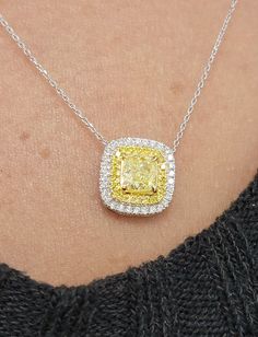 Beautiful pendant with an 0.82ct Fancy Yellow Cushion GIA in a halo of white and yellow diamonds 18kt Yellow and White Gold Yellow Diamond Halo Jewelry, Yellow Diamond Fine Jewelry Necklace, Yellow Diamond Necklace In Fine Jewelry Style, Fine Jewelry Yellow Diamond Necklace, Yellow Diamond Pendant, Expensive Purses, Yellow Diamond Necklace, Yellow Cushion, Yellow Cushions