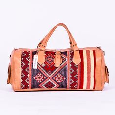 Artihandmade™ Leather Bag Are you looking for a fashion and trendy travel bag, for travelers who apreciate craftsmanship and handmade design. This kilim bag is a Must-Have for your outgoing trips due to the creative kilim patterns and high quality materials. We offer you a unique and light bag with real leather hand-dyed tanned you will certainly be in harmony with the cool and natural look. Easy to carry for Clothing-Traveling and Sports , With Two Side Pockets And Two In Interior For Accessori Traditional Rectangular Weekender Bag For Travel, Brown Vegetable-tanned Satchel For Travel, Rectangular Vegetable-tanned Satchel For Travel, Brown Weekender Bag For Overnight Trips, Traditional Rectangular Duffle Bag For Travel, Artisan Travel Shoulder Bag With Leather Lining, Artisan Shoulder Bag For Travel With Leather Lining, Artisan Shoulder Bag With Leather Lining For Travel, Travel Tote Bag With Vegetable-tanned Leather