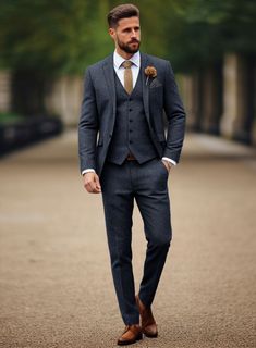 a man in a suit and tie is standing on the street with his hands in his pockets