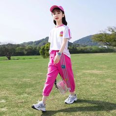 Introducing our Summer Girls Contrast Cartoon Tops and Striped Sweatpants Set, a perfect combination of style and comfort. Made with high-quality cotton and polyester, it's not only fashionable but also suitable for any season. With a regular sleeve style and O-neck collar, it's perfect for girls ages 4-12. Upgrade your little one's wardrobe today. Estimated Delivery: 20 Days-excluding weekends and holidays SPECIFICATIONS Style: Fashion /Sleeve Style: Regular Sleeve Length(cm): Short /Season: An Pink Cotton Playwear Pants, Pink Cotton Pants For Playwear, Sporty Cotton School Sets, Pink Summer Playwear Pants, Girls Back, Cartoon Tops, Full Length Pants, Striped Sweatpants, Girl's Back