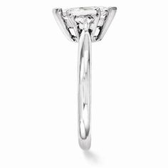 METAL SPECIFICATIONS Metal Name : White Gold 14K STONE SPECIFICATIONS Stone Name : Diamond Stone Cut : Marquise and Trillion Stone Details : There is one marquise diamond in the center approx. 1 carat (Approx. Size 9.7 x 4.7 mm) and two trillion diamonds on the side approx. 0.15 carats each (Approx. Size 3.2 x 3.2 x 3.2 mm). Natural earth mined diamonds. Total : Approx. 1.30 Carats Color : G Clarity : VS1/VVS1 RING SPECIFICATIONS Size : 6.5 (Can ship in any size, please send us a message about s