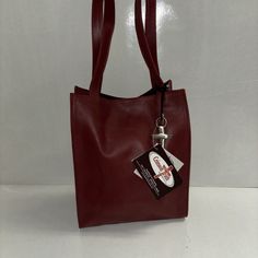 Check out NWT Leather Tote bag by Crimson Truth, the latest item I added on eBay! #eBay #eBaySeller Leather Bag With Cell Phone Pocket For Errands, Burgundy Satchel For Everyday Use, Leather Shoulder Bag With Cell Phone Pocket For Shopping, Modern Red Box Bag For Everyday Use, Leather Tote Bag With Cell Phone Pocket, Modern Red Box Bag For Everyday, Burgundy Bag With Cell Phone Pocket For Everyday Use, Burgundy Rectangular Satchel In Soft Leather, Rectangular Burgundy Satchel In Soft Leather