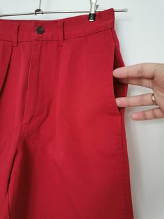 Vintage Polo Chino shorts by Ralph Lauren from the 1980's. Women's high waist preppy shorts in brick red. Pleated front, two front pockets and two back pockets. Zipper fly closure. Material: 100% Cotton Size: Marked T10. Fit like women's XXS. To be sure this item would fit you, please look at the measurements below. Approximate Measurements (taken with shorts lying flat, double waist and hips ) Waist (double that): 11.4 inches / 29 cm Hips (double that) : 18.9 inches / 48 cm Overall Length: 17.2 Retro Wide Leg Cotton Shorts, Vintage Short Cotton Pants, Vintage Cotton Short Pants, Red Bottoms With Belt Loops And Short Length, Red Shorts With Belt Loops, Retro Red Cotton Bottoms, Red High-waisted Cotton Shorts, Red Short Cotton Pants, High Waist Red Cotton Shorts