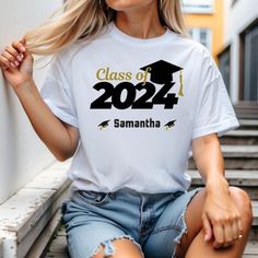 Personalized Graduation Shirt Design 2024 Graduation Shirt Senior Of 2024 Introducing Our Newest Lineup Of T-Shirts: The Gildan 5000 Series, Effortlessly Combining Style And Comfort! Offered In Sizes From S To 3xl, And An Assortment Of Lively Colors. Crafted For Enduring Comfort And Resilience. Experience Fast Shipping For Added Convenience. Require Adjustments To Your Order? Simply Contact Us After Your Purchase! White T-shirt With Letter Print For Graduation, Black Tops With Letter Print For Graduation Party, Casual White Tops For Graduation, Cotton Crew Neck Tops For Graduation Party, White Text Print Top For Graduation, Black Crew Neck Top For Graduation Party, Casual Short Sleeve Tops For Graduation Party, Casual Cotton Top For Graduation Party, White Casual Tops For Graduation