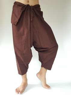 "⬇️ SHOP HERE https://www.etsy.com/ch-en/shop/IndycraftsDesigns Aladdin Pants, Harem Pants 100% Cotton Unisex pants, perfect for yoga, The fabric is cotton soft, lightweight, and airy, ideal for those warm days. If it's a bit chilly, you could always wear leggings underneath. super comfortable cotton pants made of light, comfortable to wear 100% cotton. Cotton is a natural material that wicks moisture to keep you cool, comfy & dry. Floral printed, elastic waistband,medium-weight, Soft and Co Brown Baggy Tapered Leg Harem Pants, Brown Harem Pants With Loose Fit, Brown Cotton Ankle-length Harem Pants, Traditional Bottoms With Pockets In Long Pants Style, Traditional Long Pants Bottoms With Pockets, Brown Harem Pants With Pockets, Traditional Baggy Long Pants Bottoms, Traditional Baggy Long Pants, Traditional Baggy Trousers