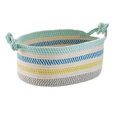 a multicolored basket with rope handles on the top and bottom, sitting on a white background