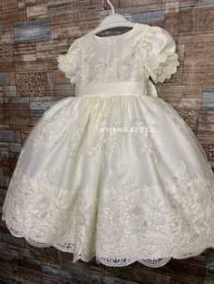 Celebrate special moments with our beautiful christening-inspired girl's dress. Crafted in pure white and embellished with delicate details, this dress is the perfect choice for such a significant occasion. It is a beautiful dress for any special occasion, it is made in any color of your preference, they are personalized. All our dresses are very well made and have good quality materials. *Underneath the main fabric there are two layers of tulle to give volume to the dress. *Soft, comfortable an Princess Style Short Sleeve Dress For Baptism, Princess Dress With Short Sleeves For Baptism, Elegant First Communion Dress With Short Sleeves For Pageants, Elegant Short Sleeve Pageant Gown, White Short Sleeve Princess Baptism Dress, Elegant Short Sleeve Princess Dress For Confirmation, Elegant Short Sleeve Baptism Dress For Party, Elegant Short Sleeve Baptism Party Dress, White Short Sleeve First Communion Dress For Pageant