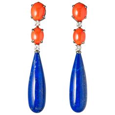 These cabochon coral and lapis lazuli chandelier earrings are a masterpiece of craftsmanship and design. The premium gemstones are carefully selected for their vibrant colour and timeless beauty. The 0.32 carat diamonds add a touch of glamour and luxury to these chandelier earrings. With their exceptional quality and sparkling shine, these diamonds perfectly complement the sophisticated design of these earrings. The earrings are made from 18 carat black gold, a popular choice for luxury jeweller Rose Gold Chandelier Earrings, Diamond Chandelier Earrings, Diamond Chandelier, Orange Jewelry, Gold Chandelier Earrings, Lapis Earrings, Diamond Cluster Earrings, Lapis Lazuli Earrings, Spike Earrings