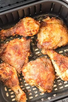 some chicken is cooking in the air fryer and it's ready to be cooked