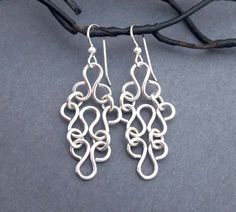 Sterling Silver Filigree Earrings Artisan Handmade Celtic Lace | Etsy Unique Sterling Silver Chandelier Earrings, Unique Silver Sterling Chandelier Earrings, Unique Silver Sterling Silver Chandelier Earrings, Unique Silver Chandelier Earrings In Sterling Silver, Wire Wrapped Sterling Silver Chandelier Earrings, Silver Spiral Earrings For Wedding, Silver Spiral Wedding Earrings, Elegant Silver-plated Wire Earrings, Small Silver Earrings