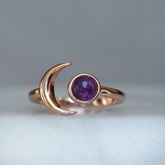 "Wanderlust Moon Ring, Rose Gold Amethyst Ring, Crescent Star Ring, Moon hugging Planet Ring, Blush Moon Ring, December stacking ring What a perfect way to say \"I love you to the Moon and back\". This dainty little moon ring is hand crafted out of 925 sterling silver with three options for plating (rose gold vermeil, Gold vermeil and sterling silver). Each natural amethyst is hand selected. Since the ring is a sterling silver base it is hypoallergenic, nickel and lead free. Each ring comes gift Celestial Style Birthstone Ring As A Gift, Celestial Birthstone Ring As A Gift, Celestial Round Birthstone Ring As Gift, Celestial Style Round Birthstone Ring As A Gift, Celestial Style Round Birthstone Ring Gift, Celestial Style Round Birthstone Ring For Gifts, Celestial Crystal Birthstone Ring Gift, Celestial Style Crystal Birthstone Ring For Gift, Moon Phase Open Crystal Ring Gift