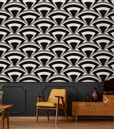 an art deco wallpaper design in black and white with geometric shapes on the walls