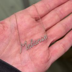 Our Diamond Custom Script Name Necklace is the newest addition to our name necklaces. Made for the true diamond lover!  Pick up to 10 letters or characters to create a one of a kind necklace. Set in solid 14K gold attached to a delicate cable chain with optional lengths. 

Largest letter ~13mm (1/2" Inch) - Shortest Letter ~6mm (1/4" Inch)
High Quality G Color VS2 Clarity Natural Diamonds

Average 7 Letter Name: 0.50ctw
14K Solid Gold
Lifetime Guarantee
Made in Los Angeles Name Necklaces, Gold Piece, Large Letters, Jewelry Inspo, Metal Necklaces, Personalized Necklace, Necklace Sizes, Name Necklace, Cable Chain