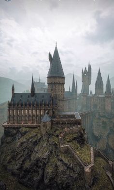 the hogwarts castle is on top of a mountain