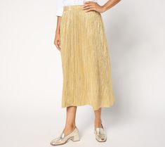 Whether you're looking to shine bright at your next cocktails-and-conversation event or just dazzle 'em at a holiday brunch, this pleated metallic midi gets your 'fit ready-carpet ready. With skirts trending hard on social posts, we're guessing you'll be looking for any excuse to wear this pleated pick. From the Joan Rivers Classics Collection®. Metallic Midi Skirt, Metallic Pleated Skirt, Holiday Brunch, Metallic Skirt, Skirt Trends, Joan Rivers, Shine Bright, Red Carpet, Dress Skirt