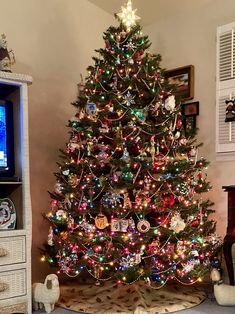 a decorated christmas tree in a living room